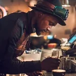 barista making coffee