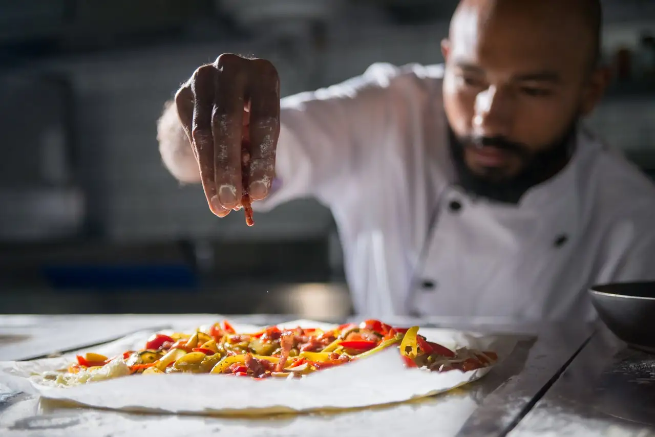 chef preparing pizza